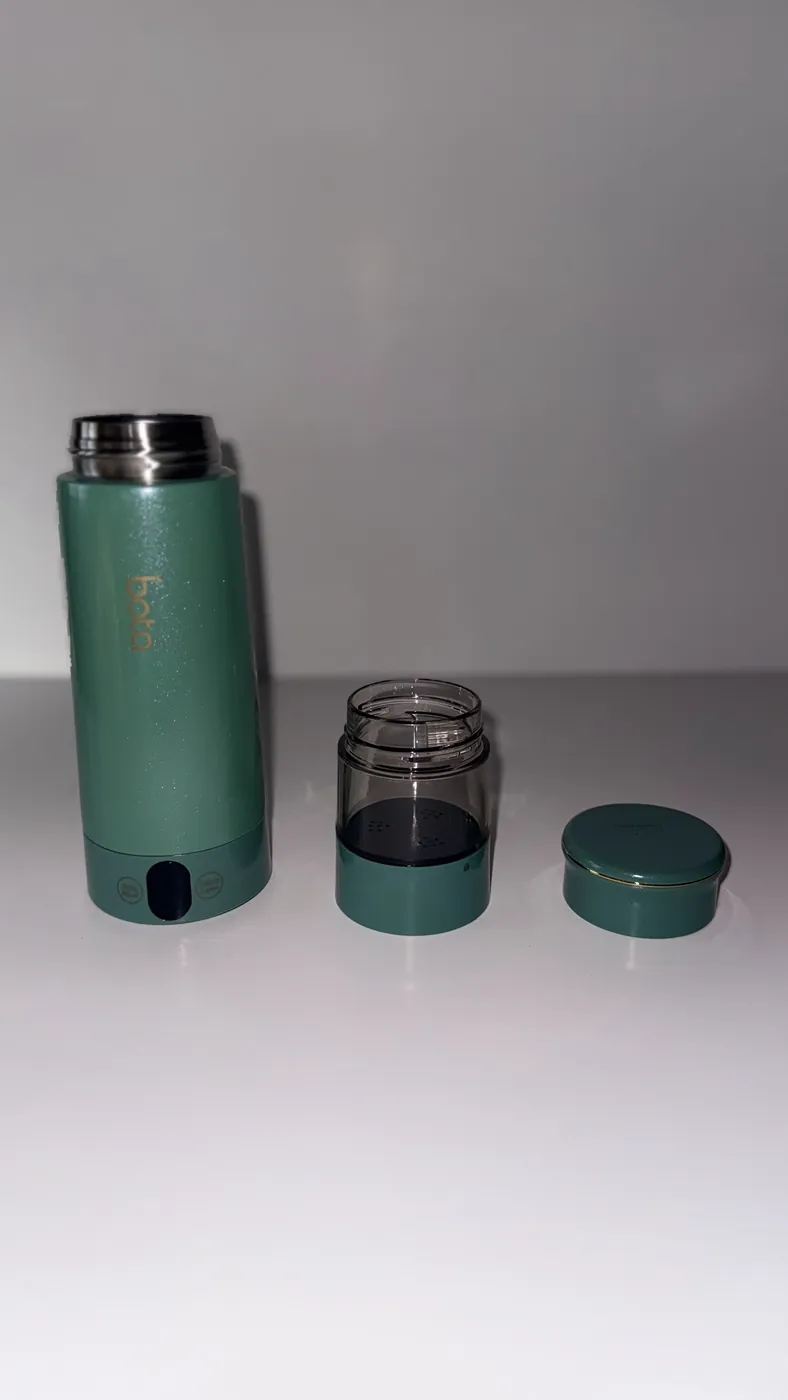 The BOTA bottle separated into lid, steeping chamber and heated body